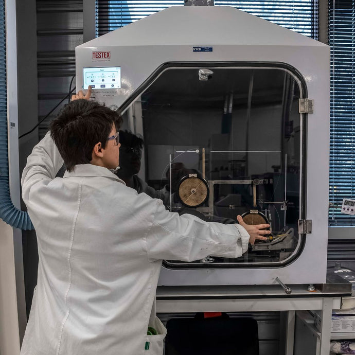 Application engineering laboratory performing polymer material testing and quality validation of thermoplastic elastomers under controlled conditions.