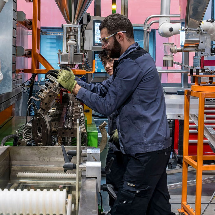 Application engineering and polymer processing setup with extrusion and material testing for thermoplastic elastomer applications.